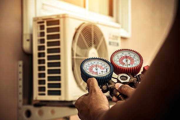 Professional Heat Pump Repair technician working in Madras, OR